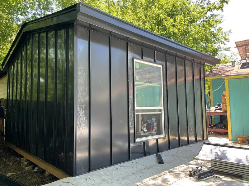 Black standing seam metal wall panels for Metal Roof Installation in Woodfield