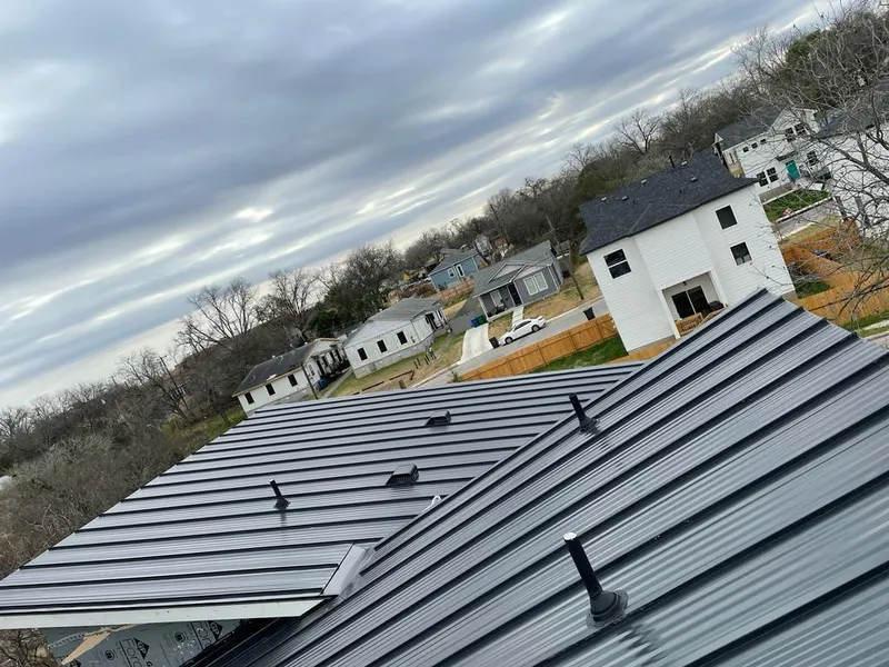 Standing seam metal roof panels with vents for Skylight Repair in Woodfield